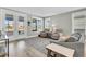 Relaxing living area with access to a patio, plush seating, and natural light at 119 Leeward Lndg, Summerville, SC 29486