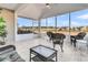 Spacious screened porch with wicker furniture and tile floor at 119 Leeward Lndg, Summerville, SC 29486