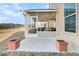 Screened porch with white door and tan siding at 119 Leeward Lndg, Summerville, SC 29486