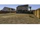 Large backyard, grassy area, and wooden fence at 1209 Hammrick Ln, Johns Island, SC 29455