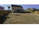 Spacious backyard with large grassy area and wooden fence at 1209 Hammrick Ln, Johns Island, SC 29455