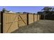 Wooden privacy fence with gate, providing backyard enclosure at 1209 Hammrick Ln, Johns Island, SC 29455