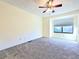 Bedroom with ceiling fan, carpet, and bay window at 1530 Fort Johnson Rd # 2 K, Charleston, SC 29412