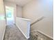 Hallway with carpet, leading to bedroom and stairs at 1530 Fort Johnson Rd # 2 K, Charleston, SC 29412
