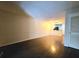 Open living room with hardwood floors and kitchen view at 1530 Fort Johnson Rd # 2 K, Charleston, SC 29412