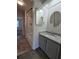Bathroom features granite vanity and updated shower at 1530 Fort Johnson Rd # 2 K, Charleston, SC 29412