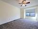 Spacious bedroom with neutral carpeting and window at 1530 Fort Johnson Rd # 2 K, Charleston, SC 29412
