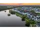 Aerial view of house with sunset in background at 1583 Paradise Lake Dr, Mount Pleasant, SC 29464