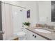 Clean bathroom with white subway tiles, granite countertop, and a bathtub at 1583 Paradise Lake Dr, Mount Pleasant, SC 29464