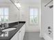Bathroom with double vanity and hexagon tile flooring at 1583 Paradise Lake Dr, Mount Pleasant, SC 29464