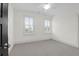 Bright bedroom with neutral carpeting and plantation shutters at 1583 Paradise Lake Dr, Mount Pleasant, SC 29464