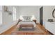Cozy bedroom with hardwood floors, a comfortable bed, and plenty of natural light at 1583 Paradise Lake Dr, Mount Pleasant, SC 29464