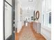 Bright entryway with hardwood floors, and view to living areas at 1583 Paradise Lake Dr, Mount Pleasant, SC 29464