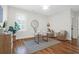 Bright home office featuring hardwood floors and built-in shelving at 1583 Paradise Lake Dr, Mount Pleasant, SC 29464