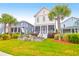 Two-story house with front porch and landscaped yard at 1583 Paradise Lake Dr, Mount Pleasant, SC 29464
