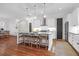 Open concept kitchen with island, stainless steel appliances, and hardwood floors at 1583 Paradise Lake Dr, Mount Pleasant, SC 29464