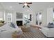 Comfortable living room featuring fireplace and hardwood floors at 1583 Paradise Lake Dr, Mount Pleasant, SC 29464