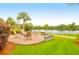Patio with seating area and lake view at 1583 Paradise Lake Dr, Mount Pleasant, SC 29464