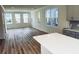 Spacious living room with hardwood floors and large windows at 764 Blueway Ave, Summerville, SC 29486