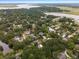 Wide aerial showcasing home and surrounding neighborhood near the water at 2028 Coker Ave, Charleston, SC 29412