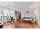 Bright exercise room with hardwood floors and home gym equipment at 2028 Coker Ave, Charleston, SC 29412