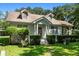 Charming 1-story house with a well-manicured lawn and mature trees at 2028 Coker Ave, Charleston, SC 29412