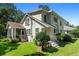 Two story house with large yard and mature trees at 2028 Coker Ave, Charleston, SC 29412