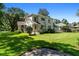 Two story house with large yard and mature trees at 2028 Coker Ave, Charleston, SC 29412