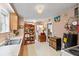 Galley kitchen with wood cabinets and ample storage at 2028 Coker Ave, Charleston, SC 29412