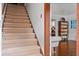 Carpeted staircase leading to the upper level of the home at 2028 Coker Ave, Charleston, SC 29412