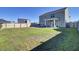 Large backyard with grassy area and patio at 268 Lucca Dr, Summerville, SC 29486
