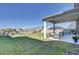Spacious backyard with covered patio and grassy area at 268 Lucca Dr, Summerville, SC 29486