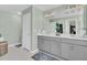 Spa-like bathroom with double vanity and gray cabinets at 268 Lucca Dr, Summerville, SC 29486