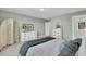Guest bedroom with a queen-size bed and plenty of closet space at 268 Lucca Dr, Summerville, SC 29486