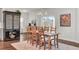 Bright dining room with wooden table and access to the backyard at 268 Lucca Dr, Summerville, SC 29486