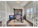 Home office features built-in shelving and hardwood floors at 268 Lucca Dr, Summerville, SC 29486