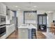 Modern kitchen with stainless steel appliances and an island at 268 Lucca Dr, Summerville, SC 29486