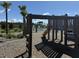 Wooden playground with ladder, slide, and nearby pond views at 268 Lucca Dr, Summerville, SC 29486