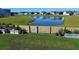 Backyard pond view with garden and wooden fence at 268 Lucca Dr, Summerville, SC 29486