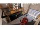 Two-story garage with a mezzanine and a red car in the center at 3100 Fickling Hill Rd # 31, Johns Island, SC 29455
