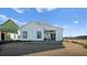 White farmhouse-style home with covered patio at 320 Trailmore Ln, Summerville, SC 29486