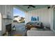 Covered patio with fireplace, seating, and blue accents at 320 Trailmore Ln, Summerville, SC 29486
