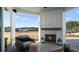 Outdoor patio with fireplace and comfortable seating at 320 Trailmore Ln, Summerville, SC 29486