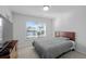 Cozy bedroom with a double bed and large window at 467 Eagleview Drive, Moncks Corner, SC 29461