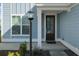 Charming front entrance with a dark brown door and lamp post at 467 Eagleview Drive, Moncks Corner, SC 29461