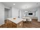 Kitchen island with white countertop and gold accents at 467 Eagleview Drive, Moncks Corner, SC 29461