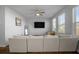 Living room with sectional sofa and mounted TV at 467 Eagleview Drive, Moncks Corner, SC 29461
