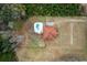 Overhead view of house and pool in rural setting at 4712 Westervelt Rd, Meggett, SC 29449