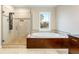 Bathroom boasts a large soaking tub and walk-in shower at 4712 Westervelt Rd, Meggett, SC 29449