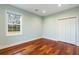 Bedroom with hardwood floors, window and closet at 4712 Westervelt Rd, Meggett, SC 29449